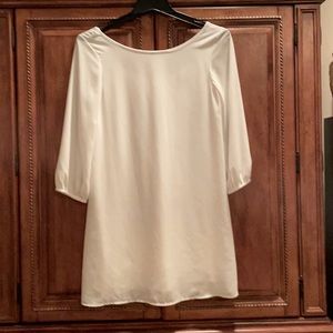 White loose fitting above knee dress